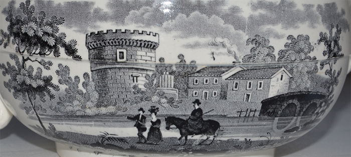 Фрагмент чайника з сюжетом із круглою баштою на березі річки.
